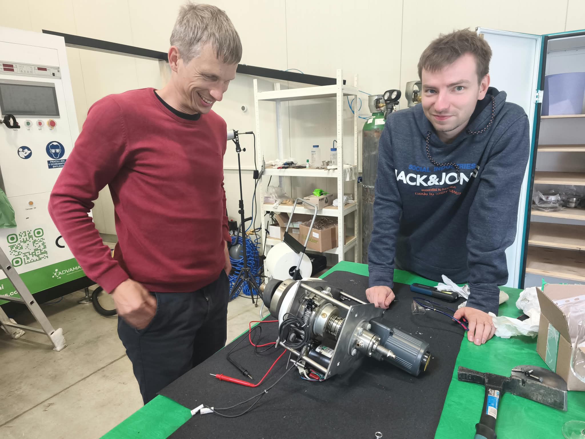 AdvaMat technicians servicing a PVD coating system